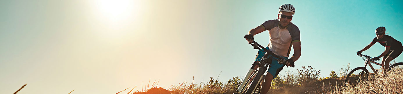 Mountain bikers riding on a hillside