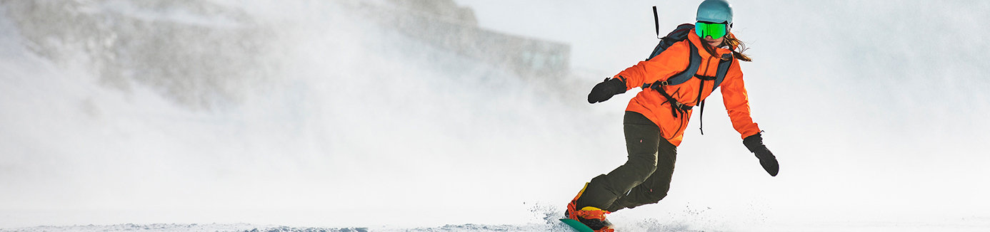 Woman snowboarding