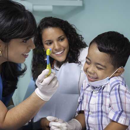 Child receiving a flouride treatment