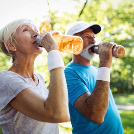 Elderly people drinking water