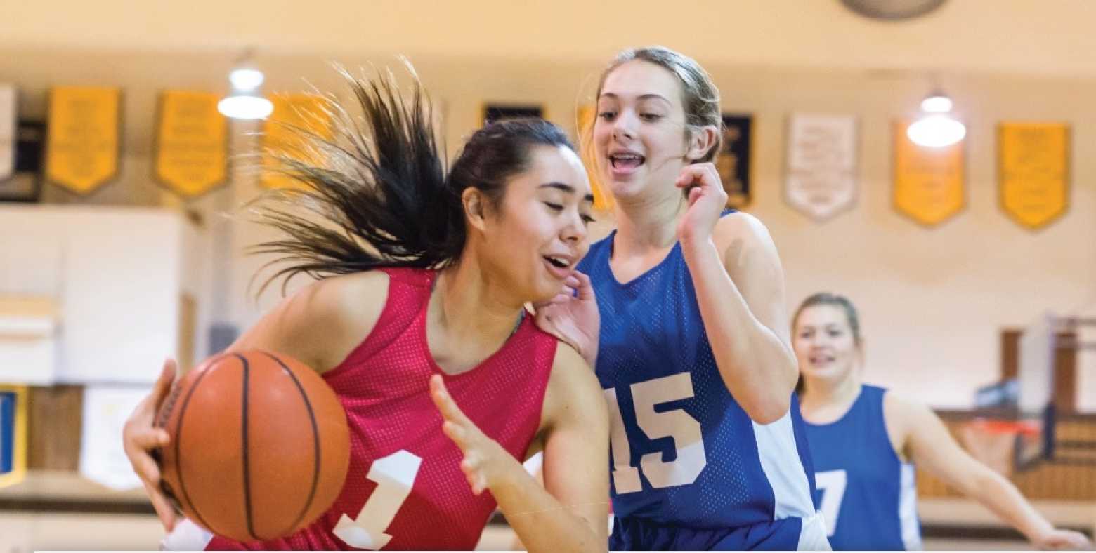 girls playing basketball