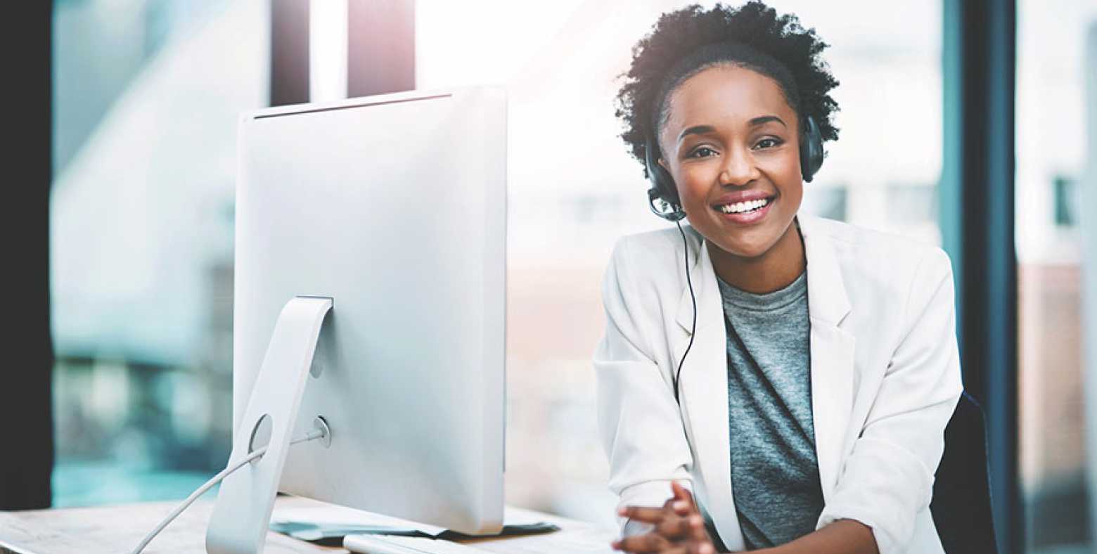 Customer service agent smiling