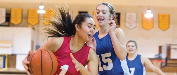 girls playing basketball